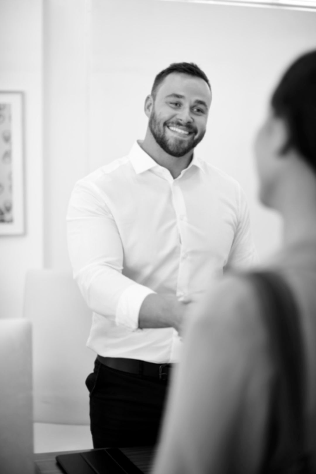 You must trust your salesman. Photo of a businessman shaking hands with his customer.